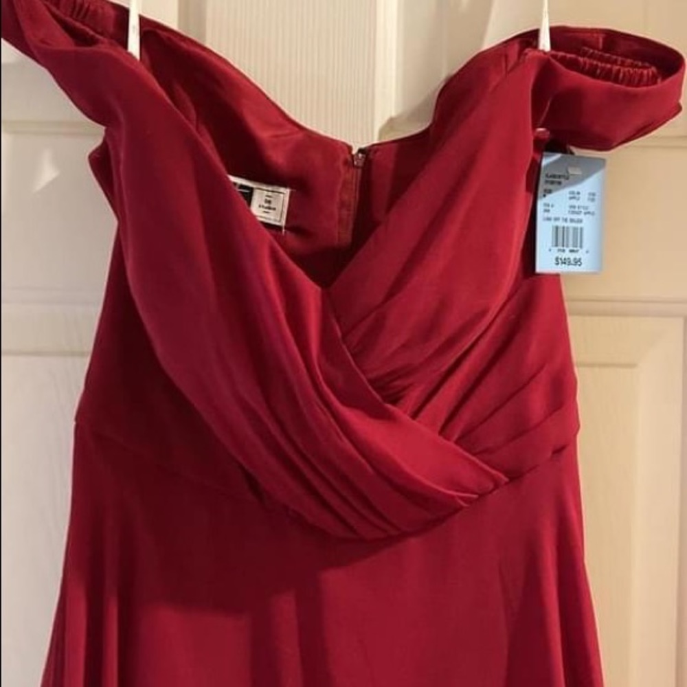 David’s Bridal dress, size 6 in Apple. New with tags. Too small, never worn.